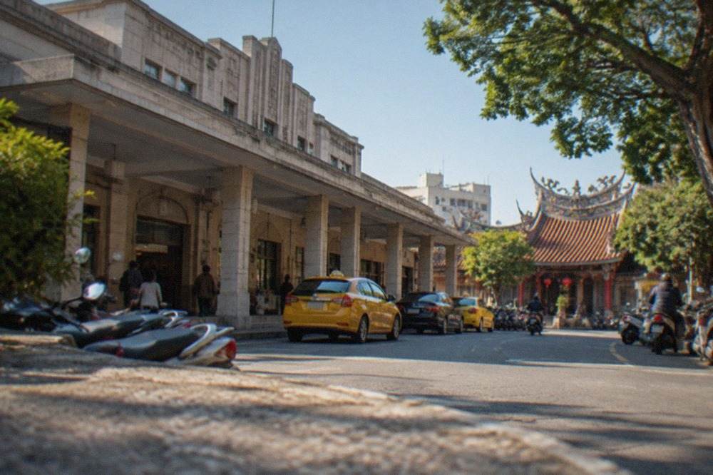 A sunny winter day in Tainan with a historic temple courtyard and clear blue sky