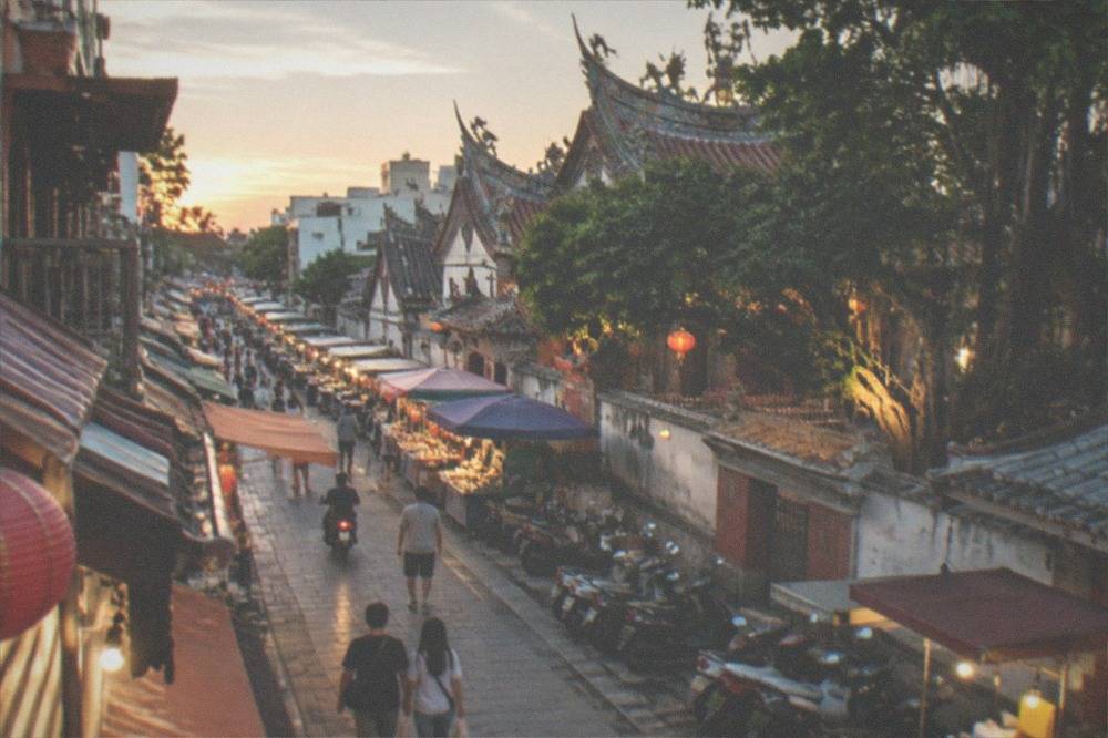 Lit historic street in Tainan's old quarter at night