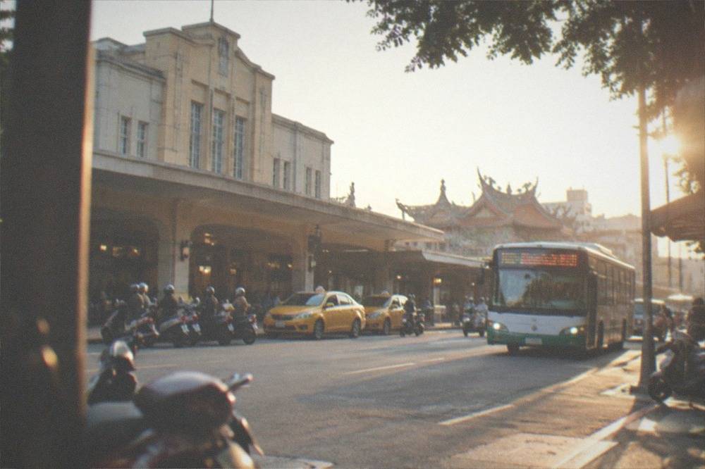 A city bus in Tainan at a stop with route information displayed on its front