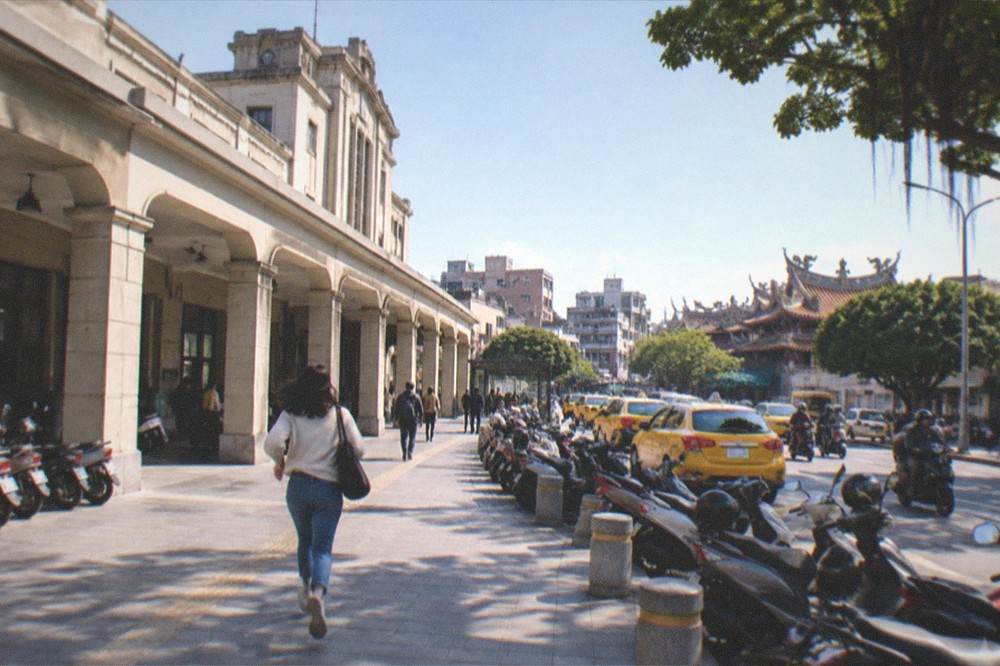 A wide view of Tainan rooftops under a clear blue winter sky