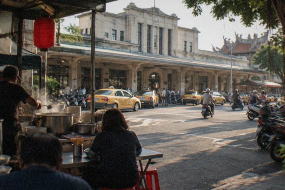 A street food stall in Tainan serving bowls of soup to evening customers