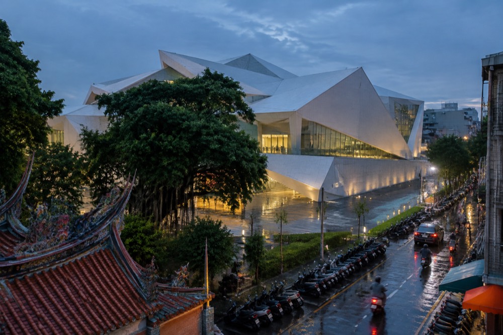 The Tainan Art Museum building illuminated at night