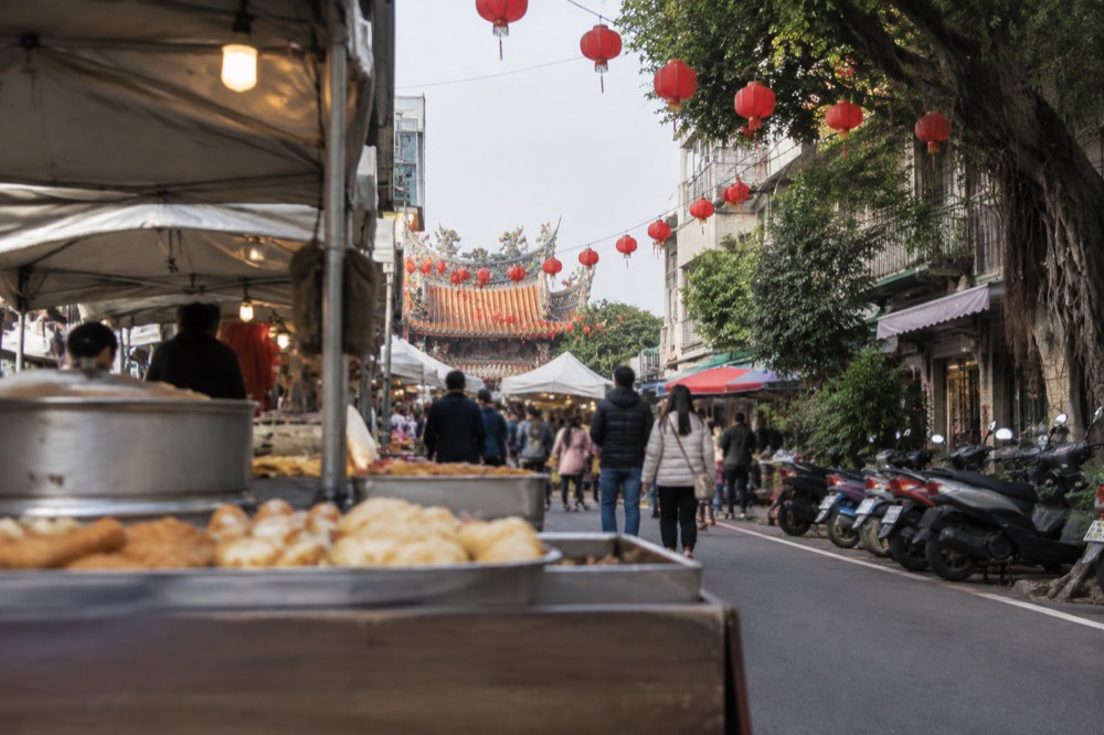 Paper lanterns strung across a Tainan plaza during a winter festival