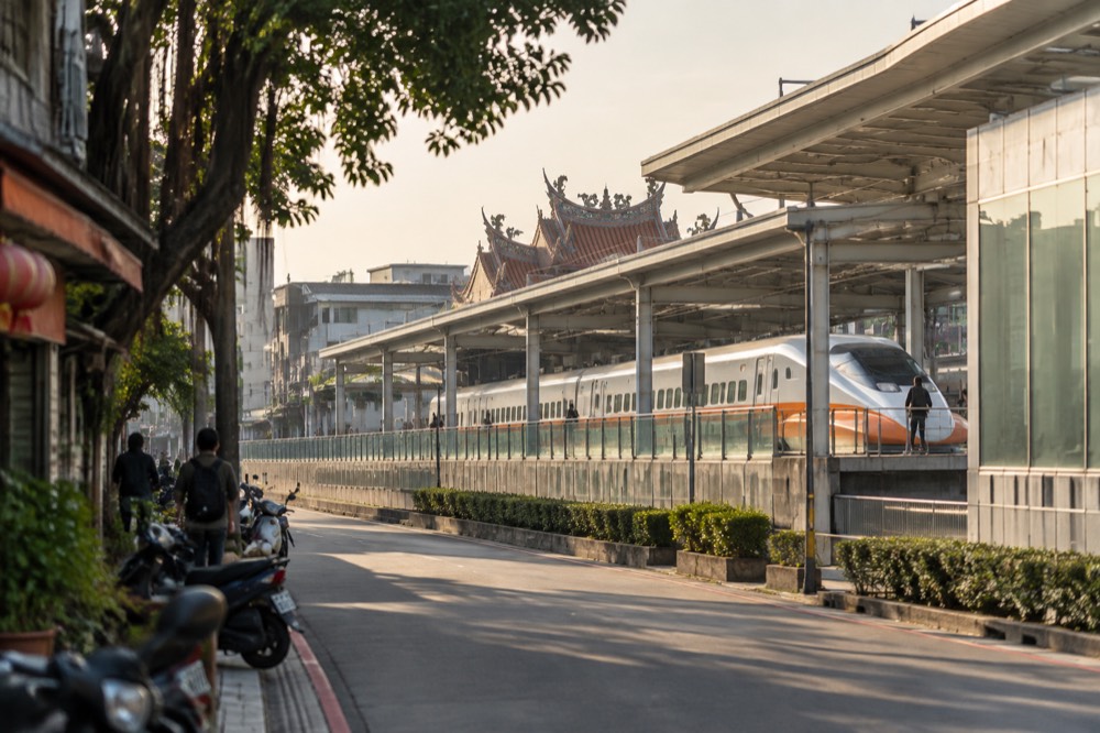 Taiwan high speed rail train arriving at a modern station platform